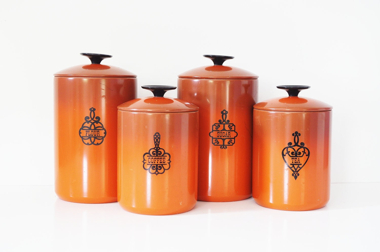 Burnt orange west bend kitchen canisters