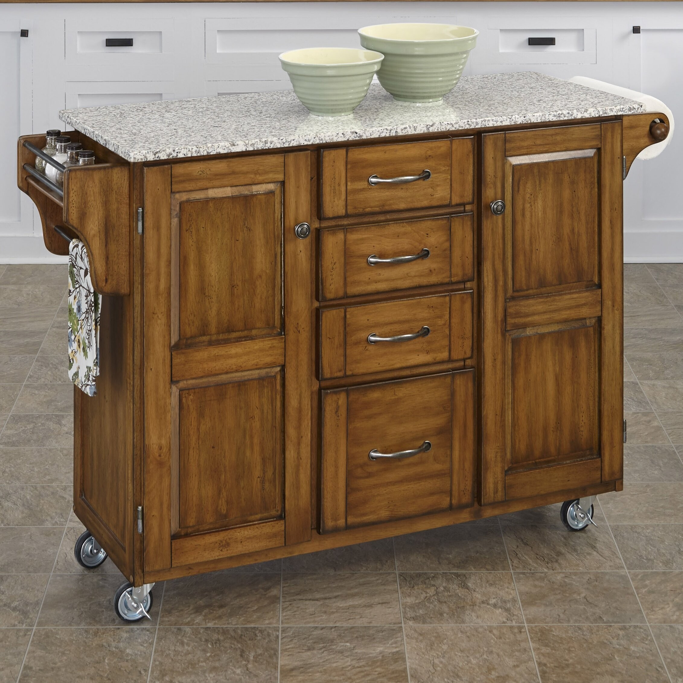 Home styles create a cart kitchen island with granite top