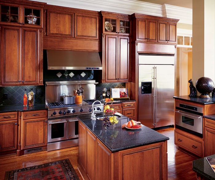 Kitchen with cherry cabinets decora cabinetry