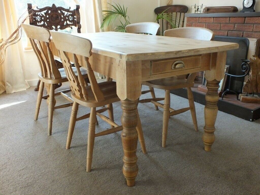 Old vintage rustic farmhouse kitchen dining table with