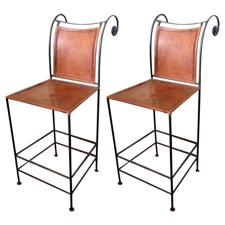 One pair of leather and iron bar stools at 1stdibs