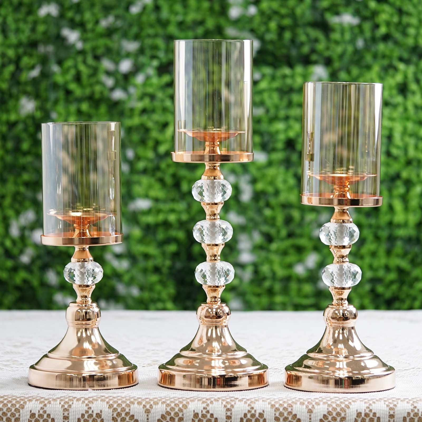 Set of 3 gold metal pillar candle holder set with