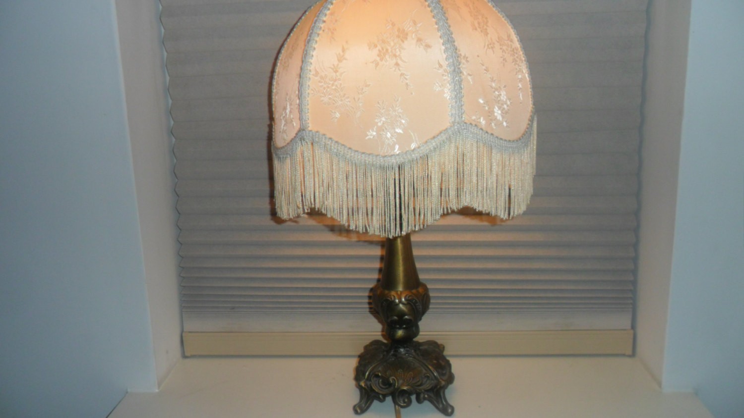 Vintage brass table lamp with tassel linen shade by