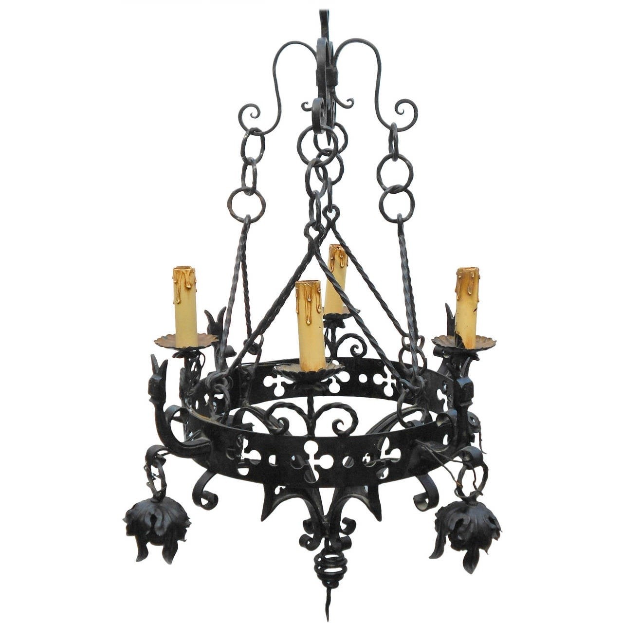 Gothic iron chandelier with horned faces for sale at 1stdibs