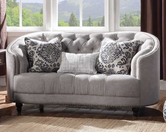 Julia curved light gray curved tufted loveseat with plush