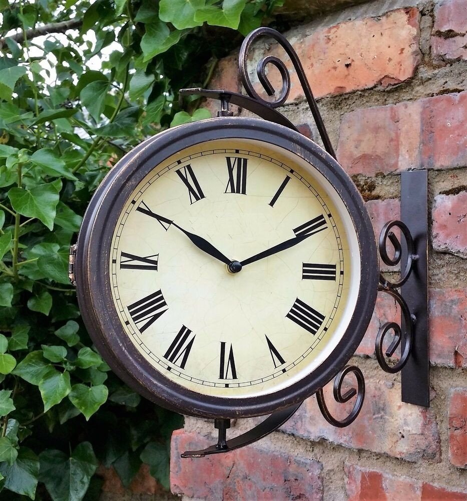 Outdoor garden wall station clock temperature with