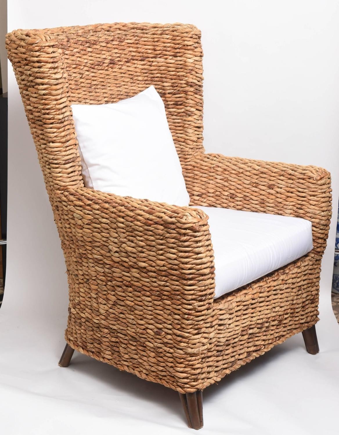 Pair of large woven banana leaf wing chairs at 1stdibs