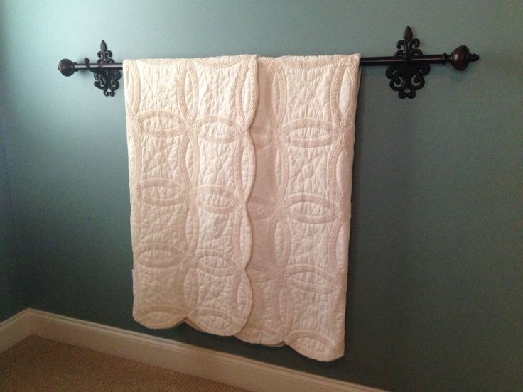 Quilt hanger curtain rid and wrought iron hooks wrought