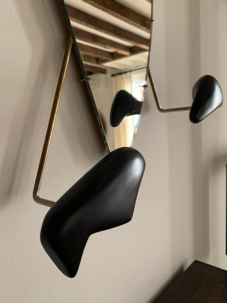 Wall mounted coat rack with mirror by georges jouve for