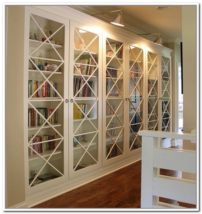 White bookcase with glass door for elgant interior with