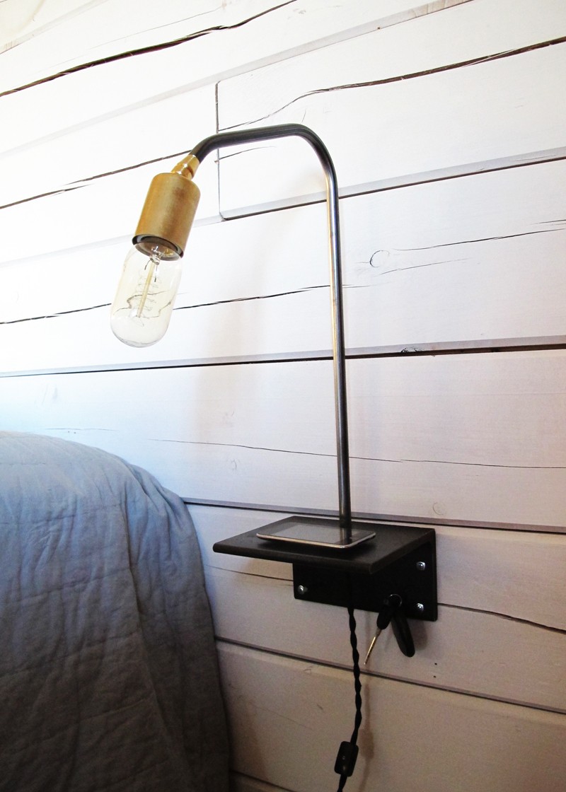 Create a tranquil retreat with wall mounted bed lamps 3