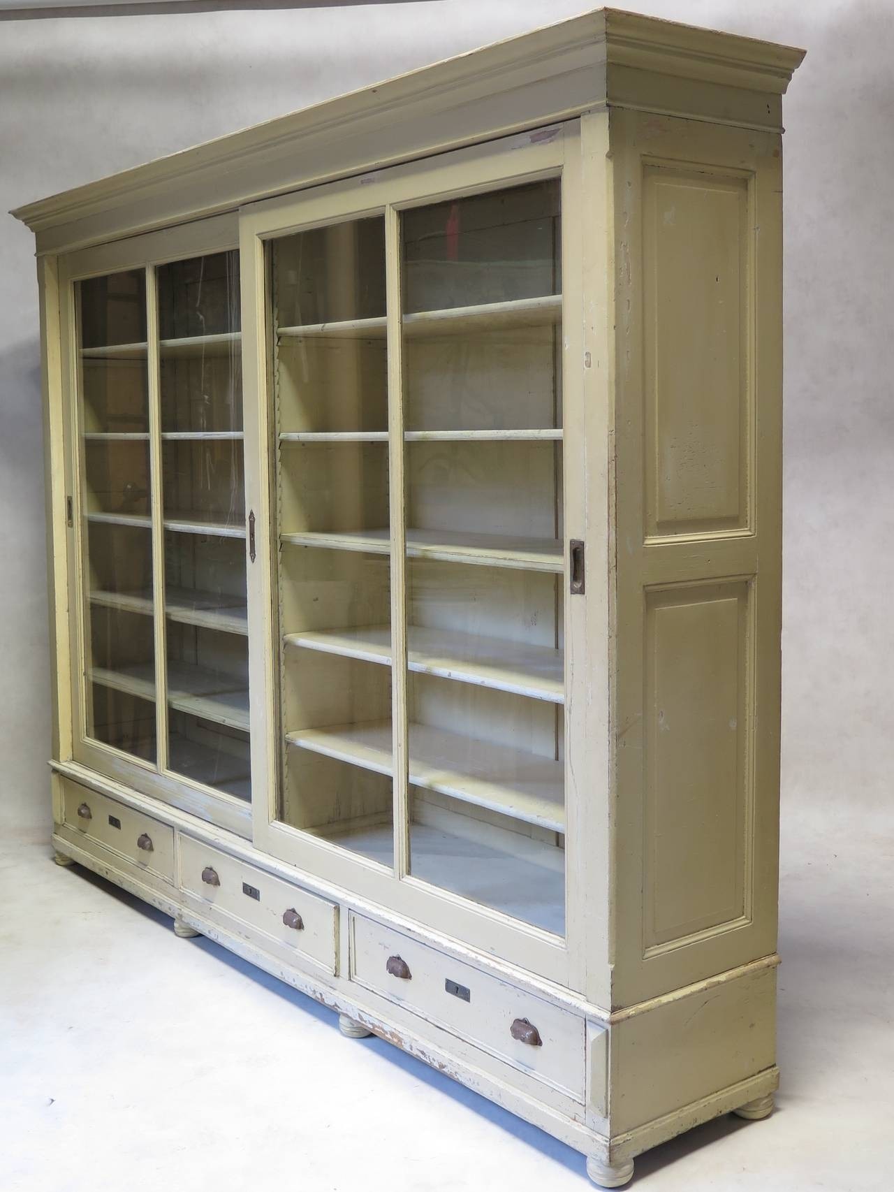 Elegant bookcase with sliding glass doors france early 3