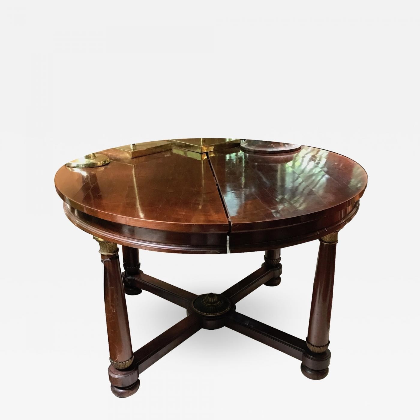 Empire dining style table with bronze details