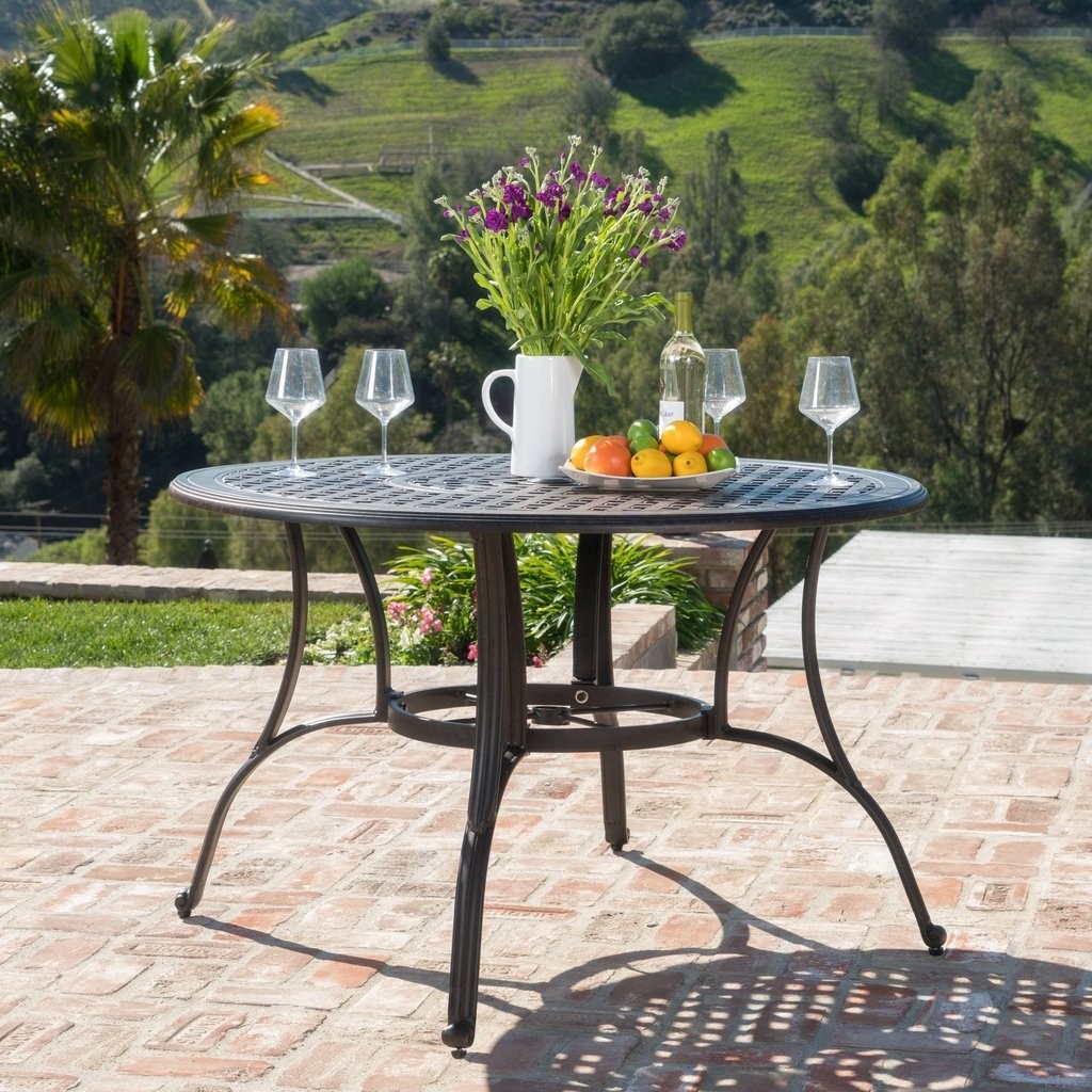 Fonzo outdoor bronze cast aluminum circular dining table