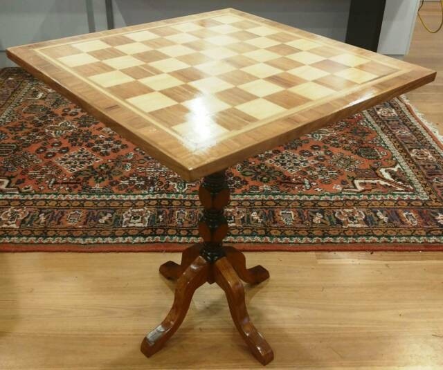 Inlaid chess board coffee table in solid timber sit