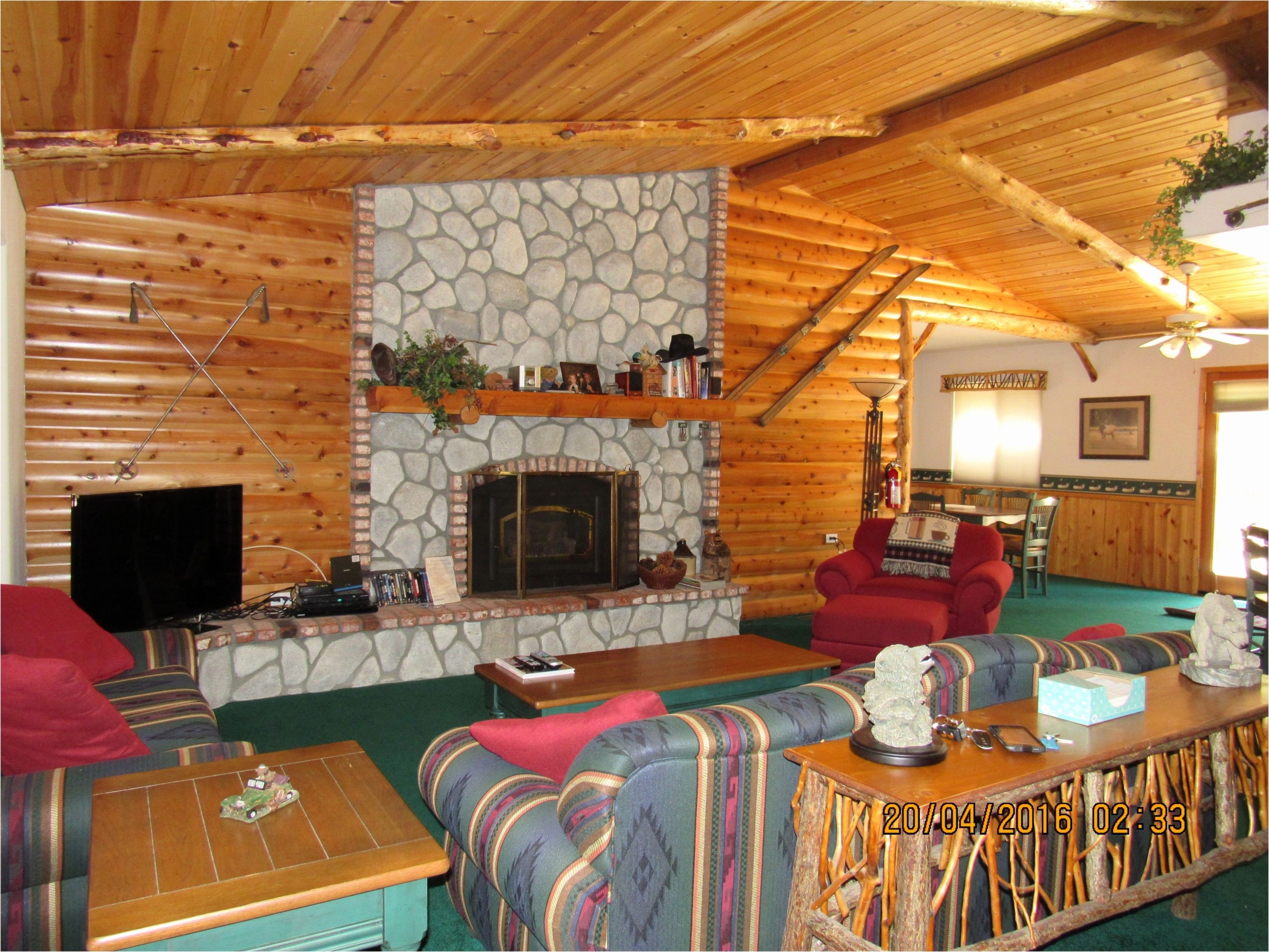 Log cabin living rooms inspirational 5 cozy hearths dwell