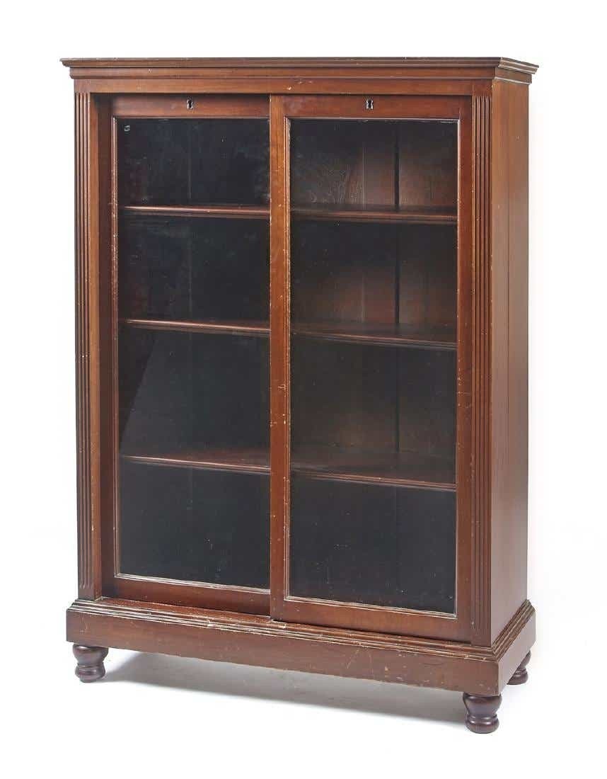 Mahogany bookcase with sliding glass doors