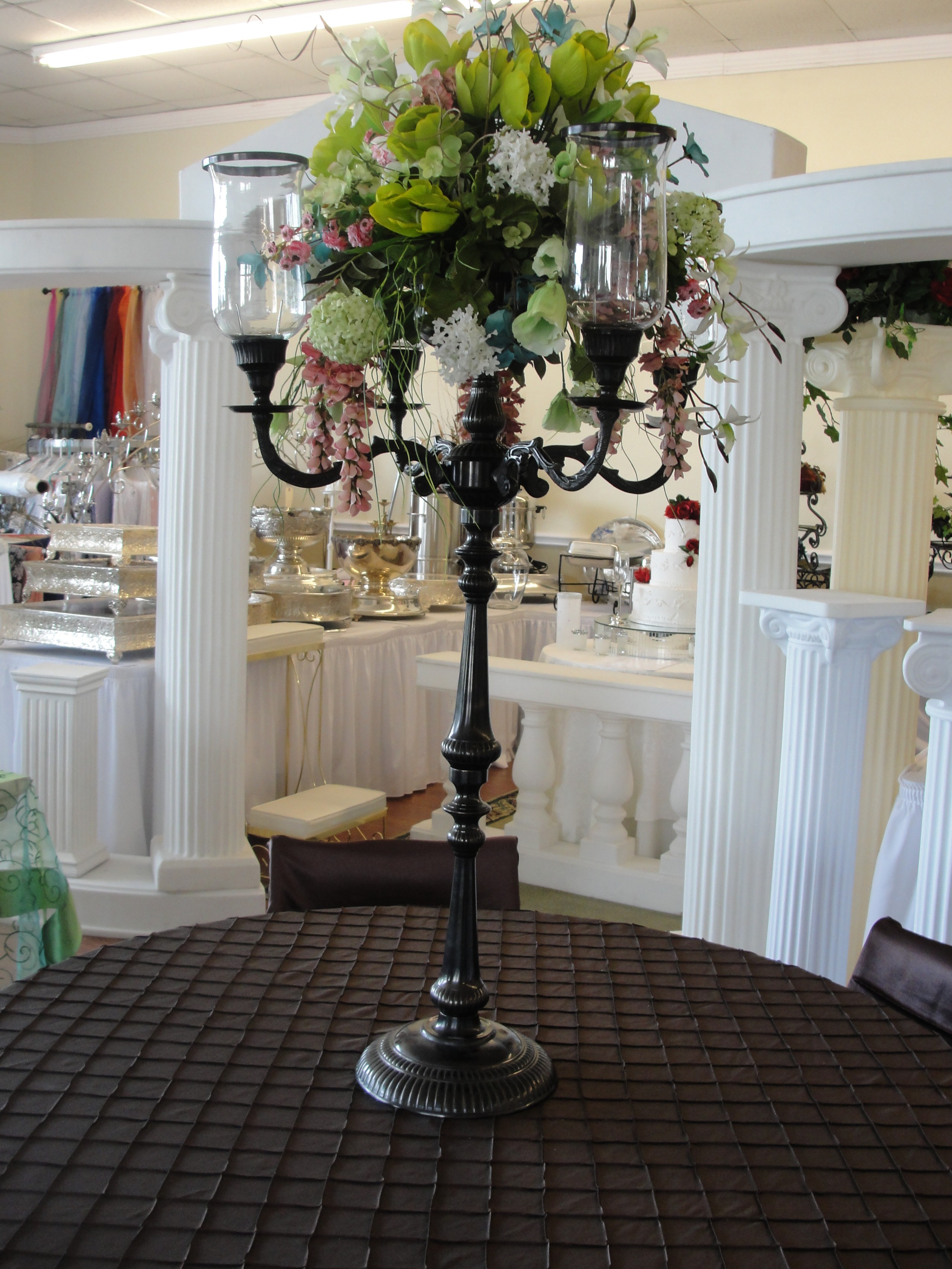Simply elegant weddings wrought iron candelabra rentals