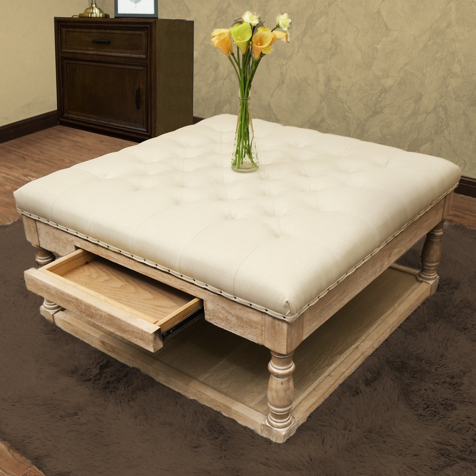 Suleiman tufted padded cocktail ottoman with shelf and