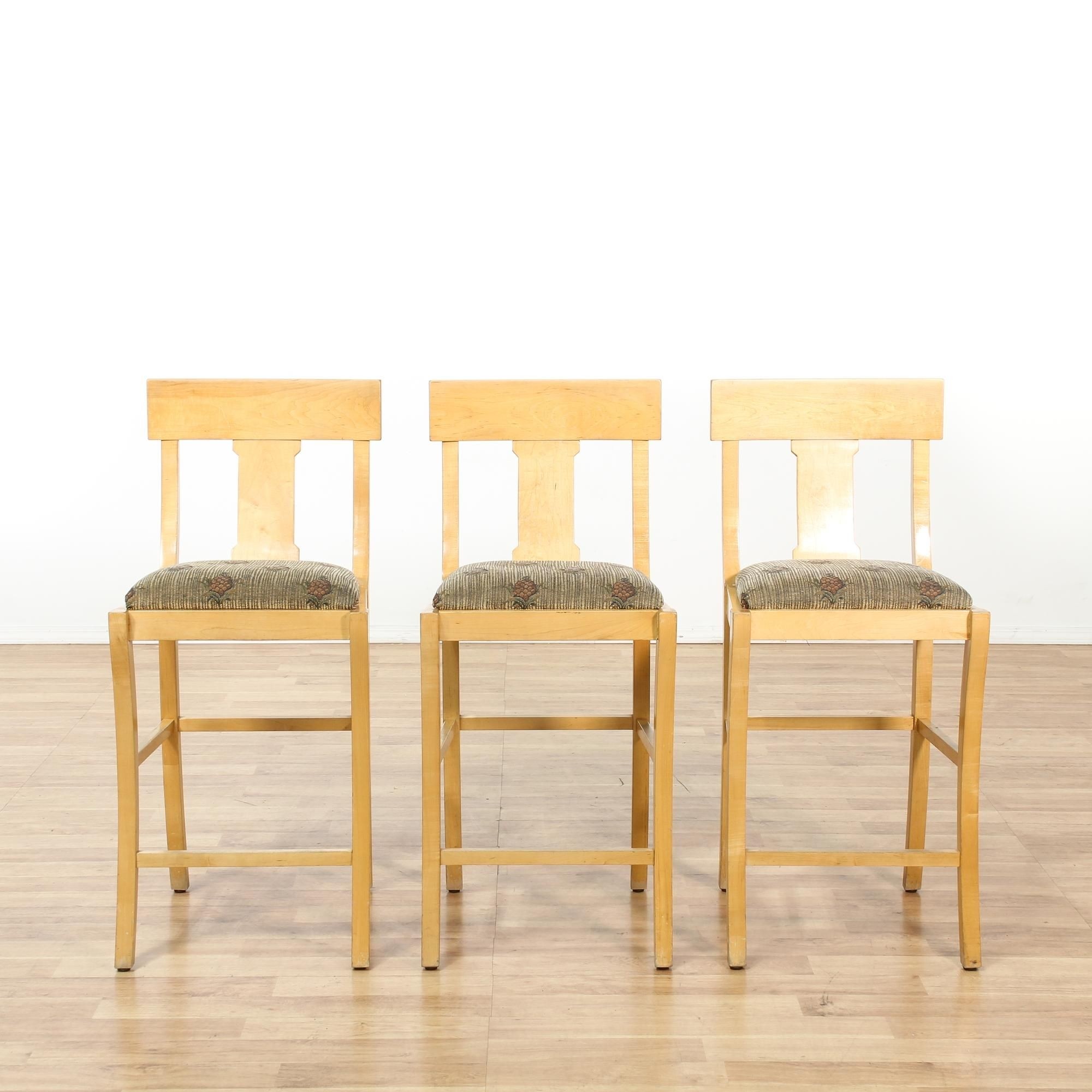 This set of 3 barstools are featured in a solid