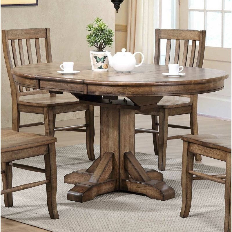 Charmine extendable solid wood oval dining table reviews