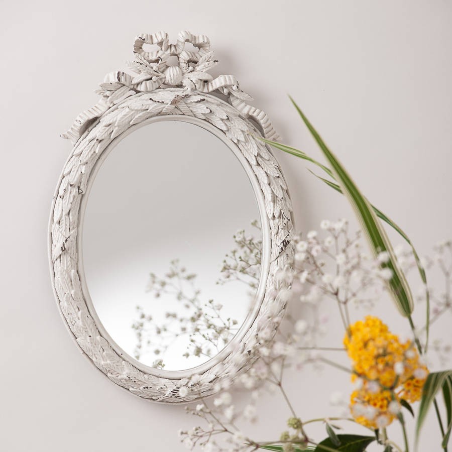White oval vintage bow mirror by hand crafted mirrors