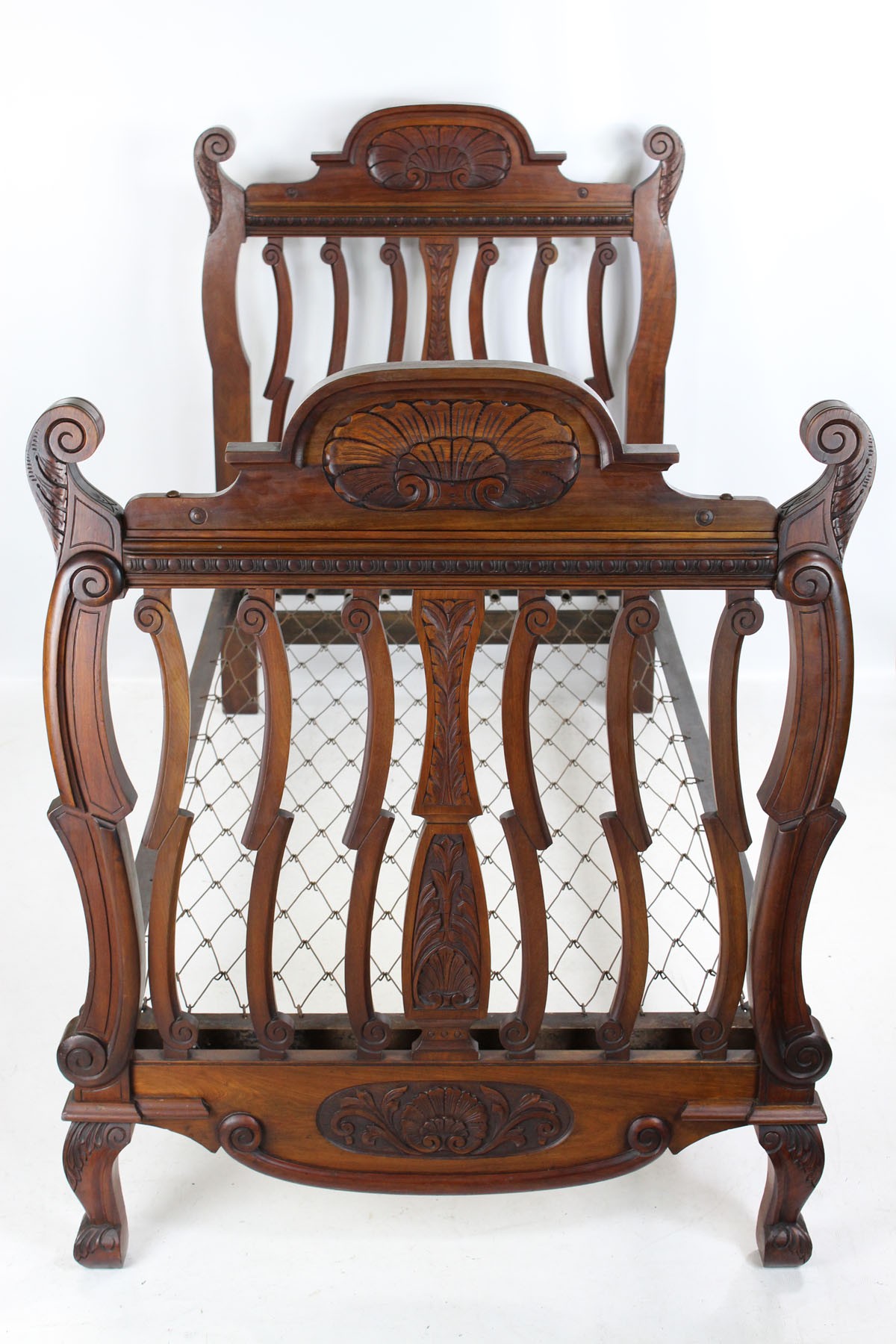 Victorian carved walnut single bed