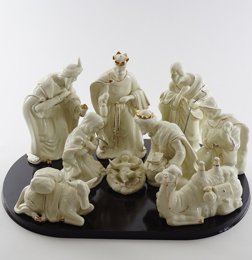 White porcelain nativity scene with gold accents ebth