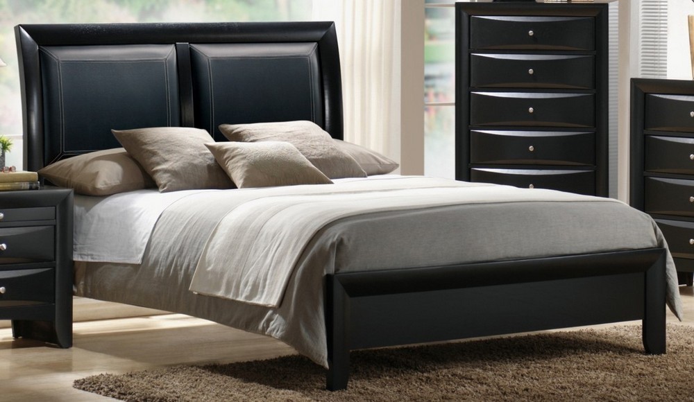 Adelyn black wood king bed with faux leather headboard by