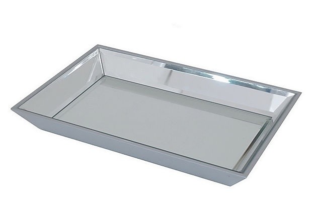 Beveled mirrored tray on onekingslane on top of an 1