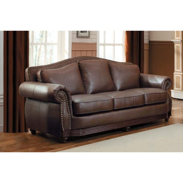 Bonded leather sofa with rolled arms and camel back design