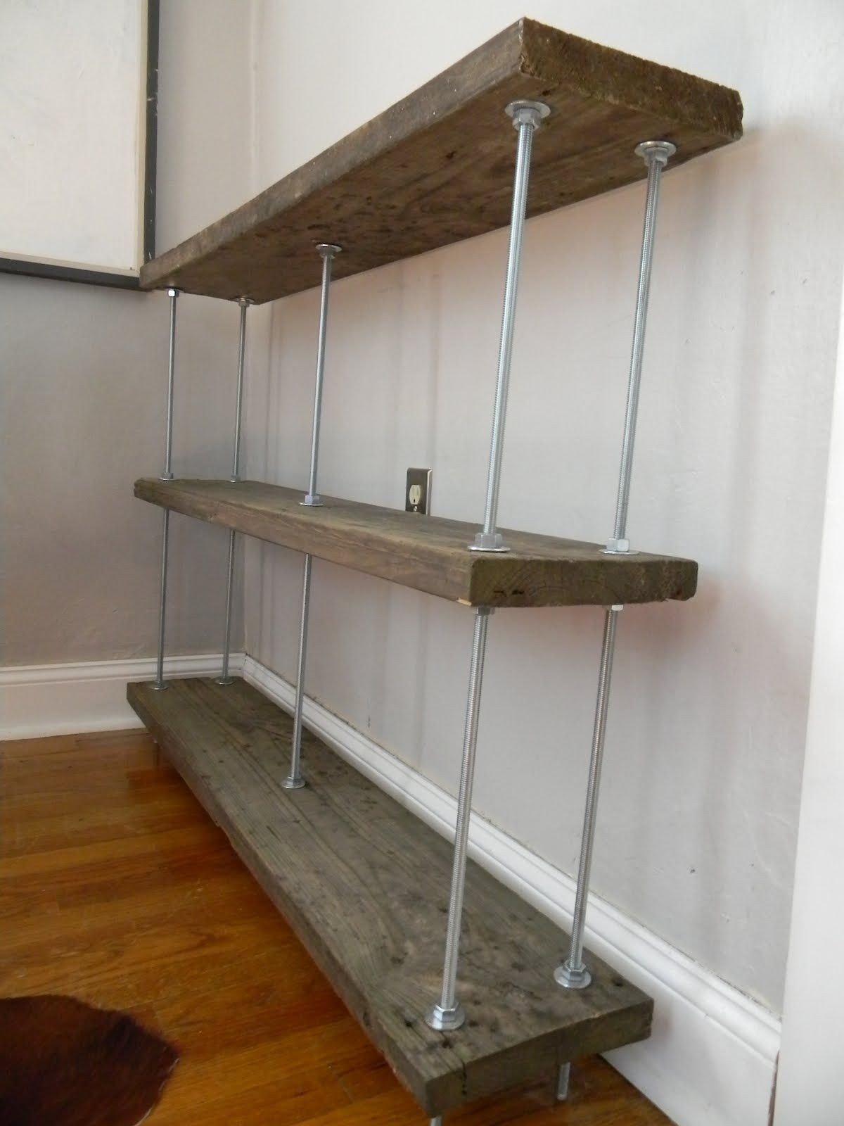 Bookshelf with reclaimed wood and threaded rods
