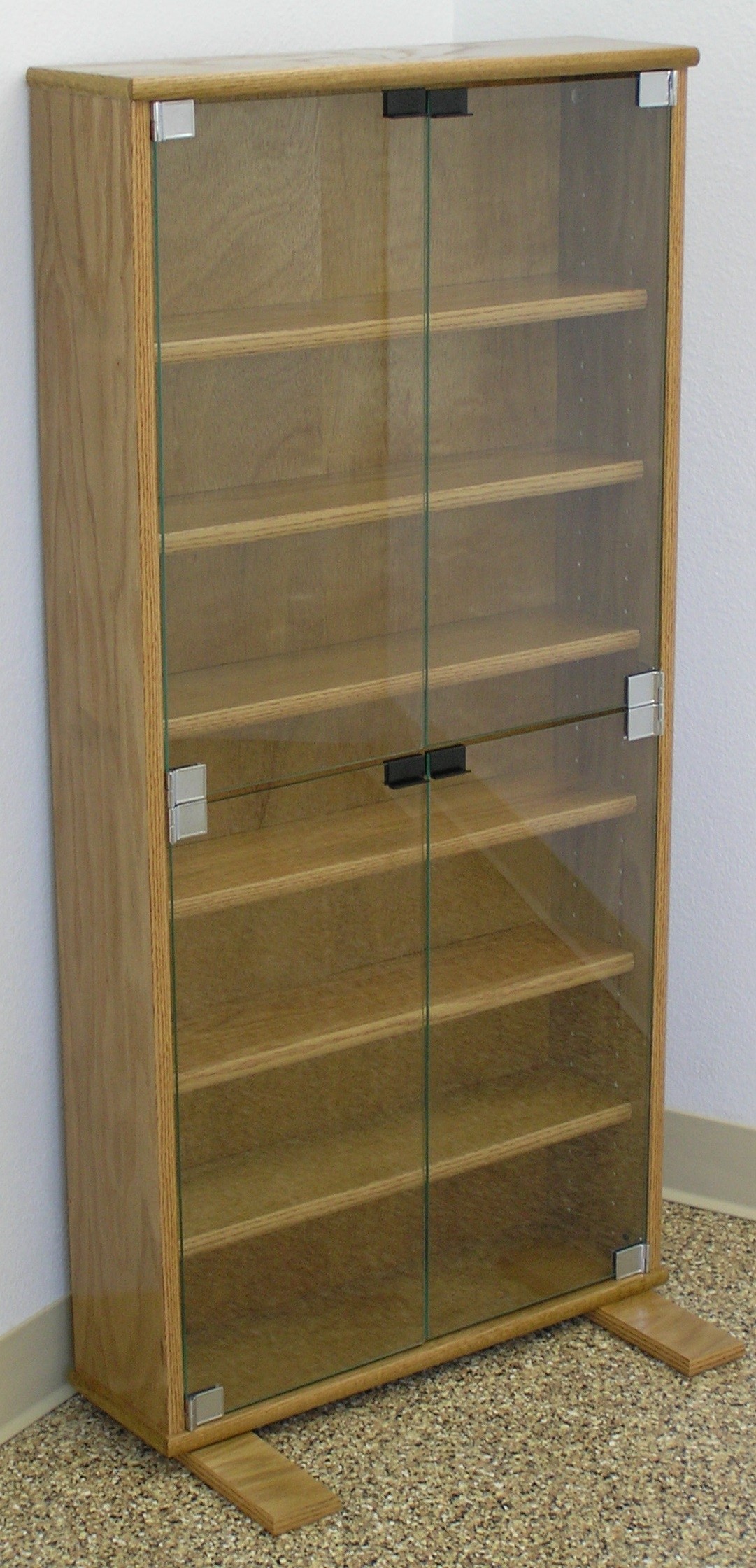 Dvd bookcase with glass doors in oak or maple by