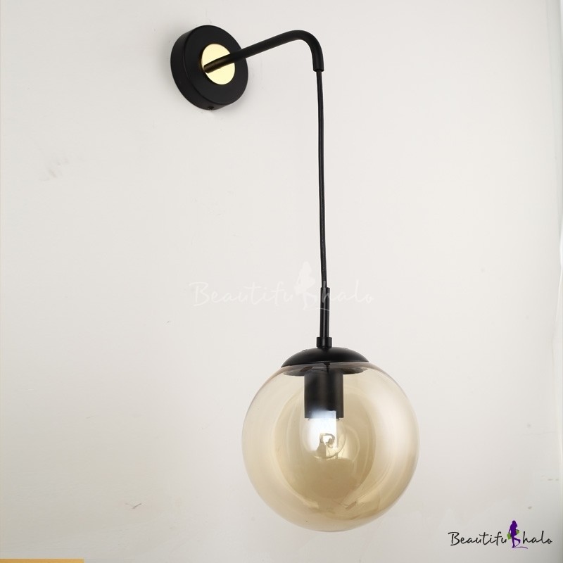 Industrial hanging wall sconce with 7 09w globe glass