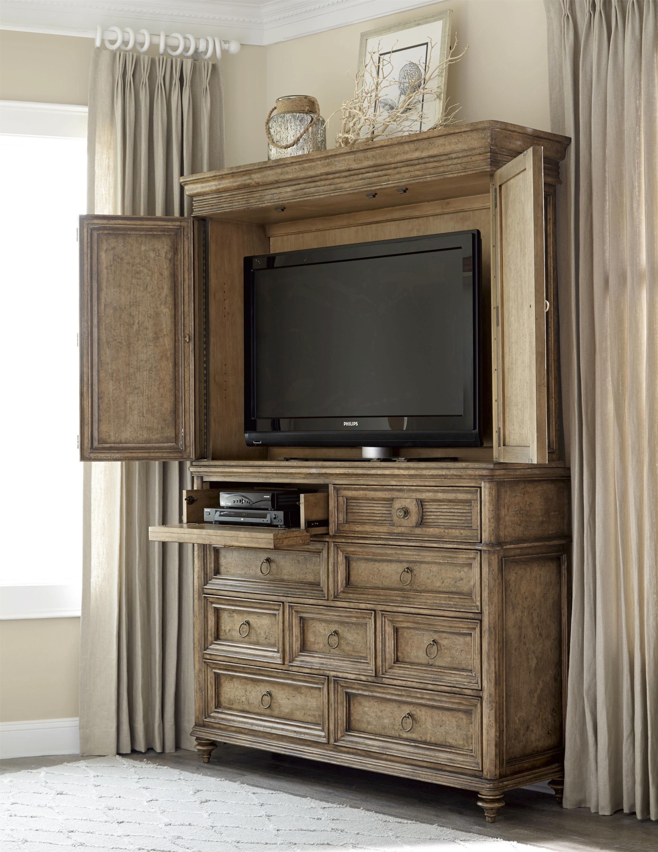 This grand armoire offers great style and function to a
