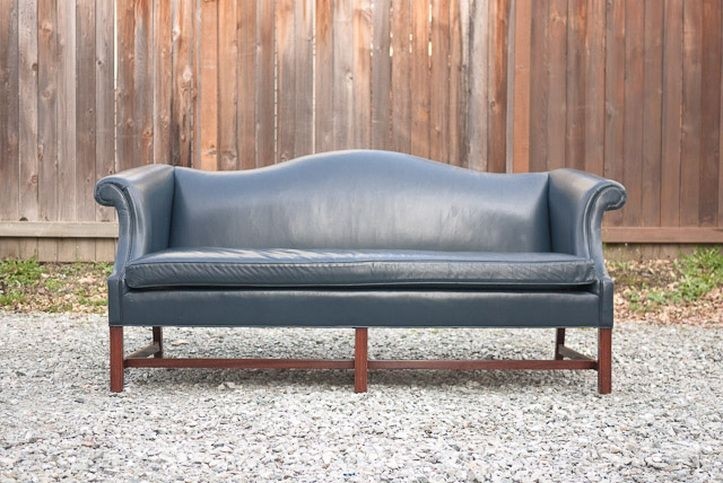 Vintage navy leather camelback sofa i would put this in