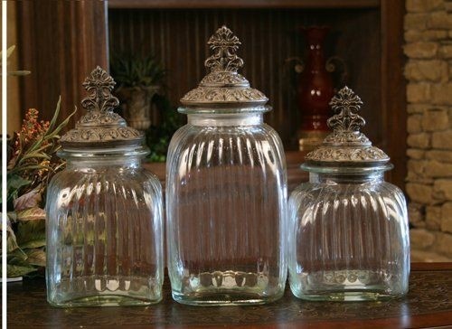 Clear decorative glass canister set with cross lids set
