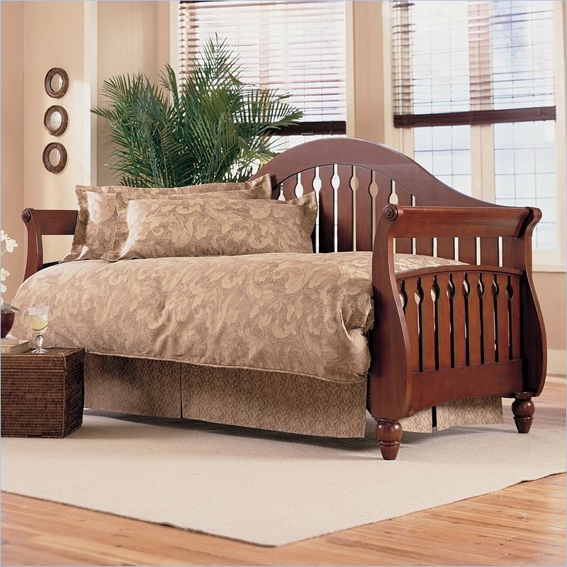 Fraser wood daybed in walnut finish with pop up trundle