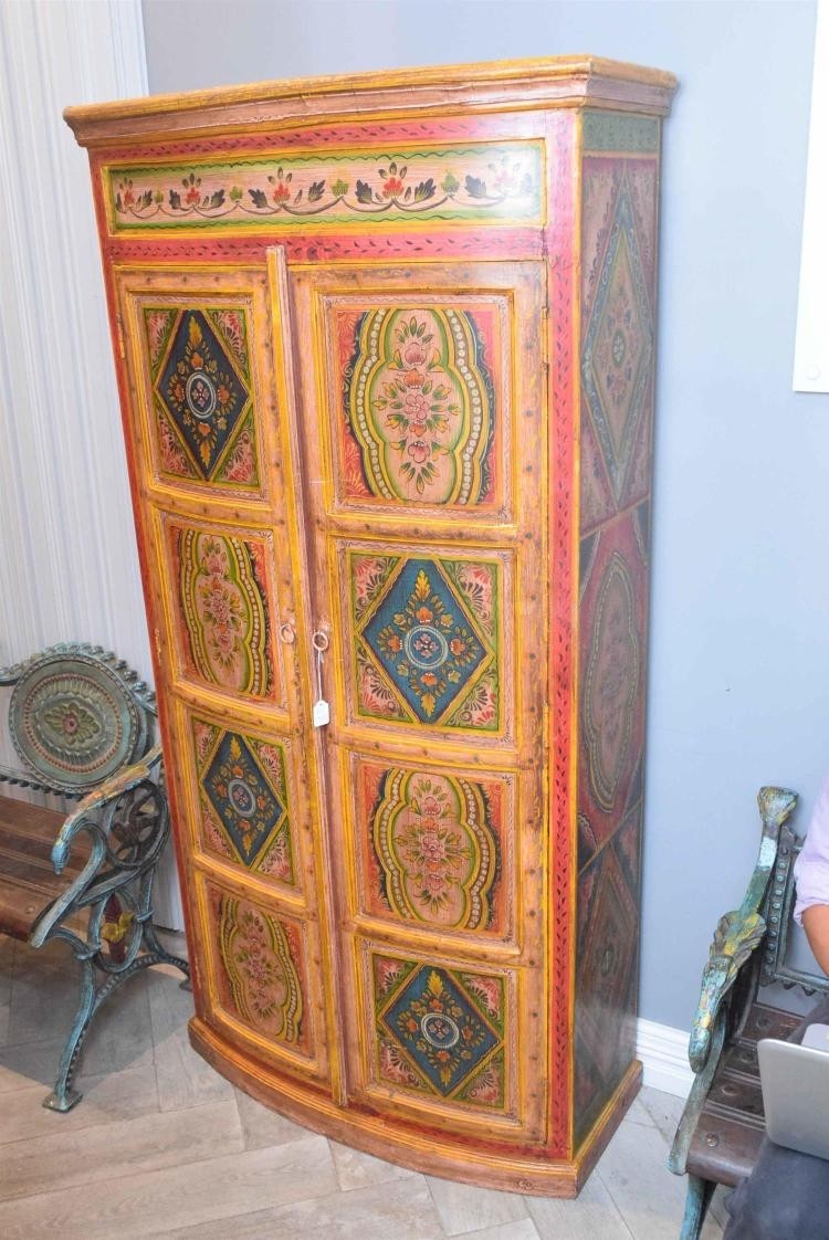 Large wooden 2 door cabinet with hand painted floral pattern