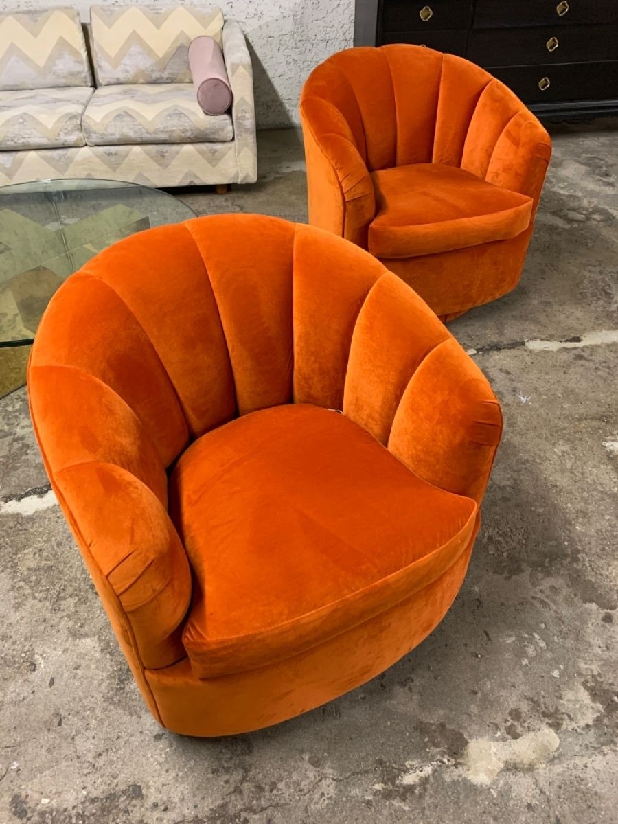 Mid century hollywood regency orange swivel chairs