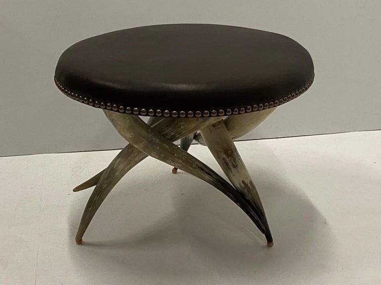 Fantastic large round horn and leather ottoman coffee