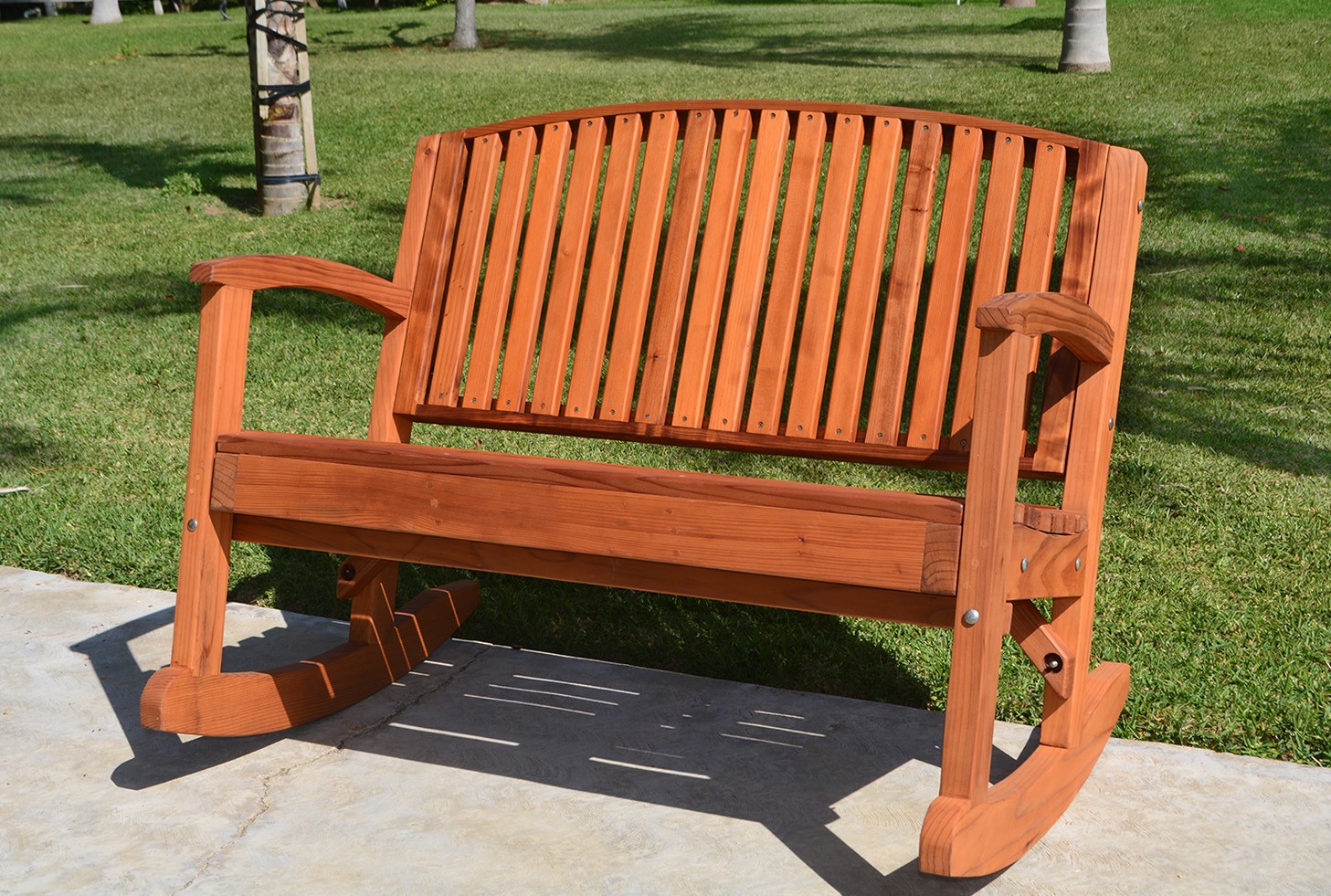 Outdoor wooden rocking bench custom redwood benches