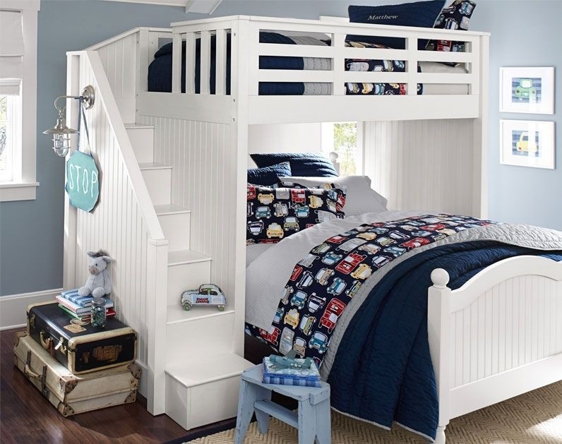 Top bunk bed with desk underneath foter shared
