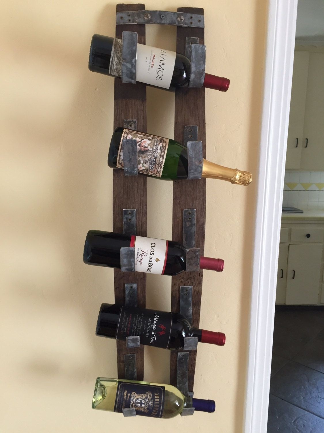 I really like this hanging wine rack wine rack wall