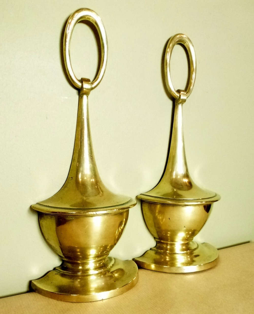 Pair of antique brass door stops 259674