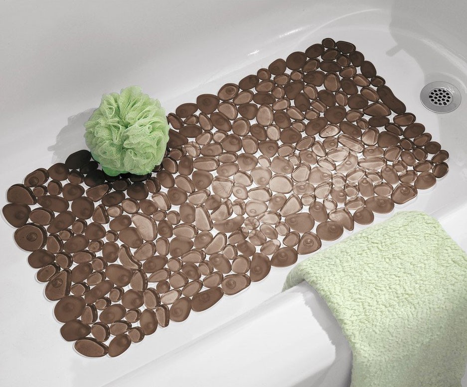 Pebble bath mat in shower and bath mats