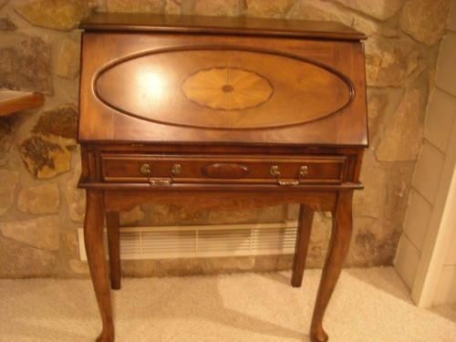 Small secretary desk with fold down writing surface for