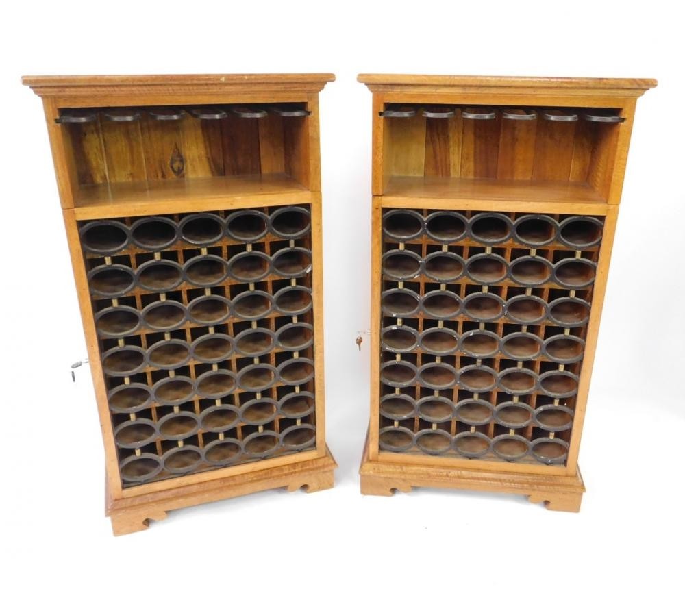 A pair of hardwood and cast iron wine racks each
