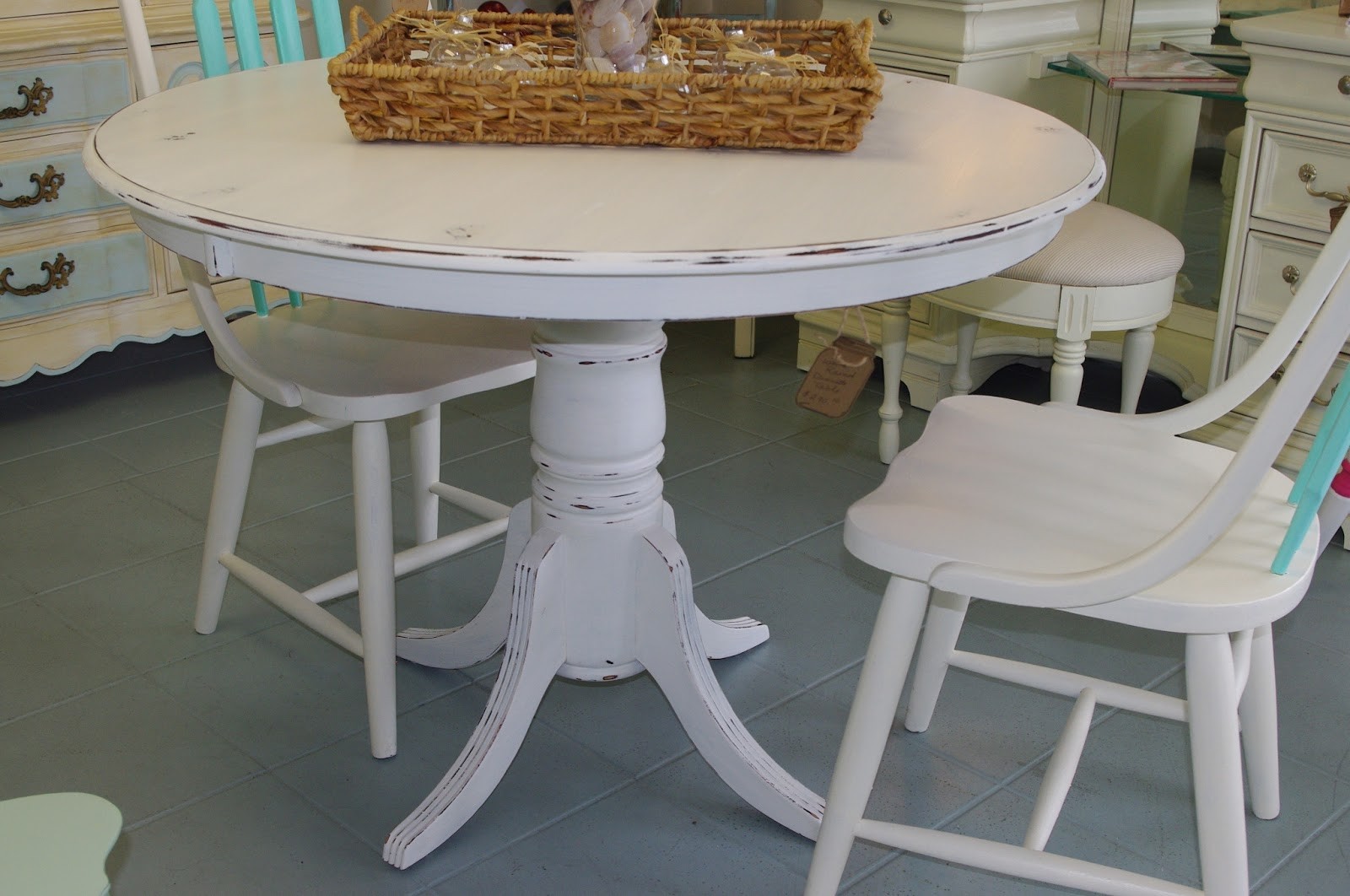 Coastal chic boutique distressed white round dining table
