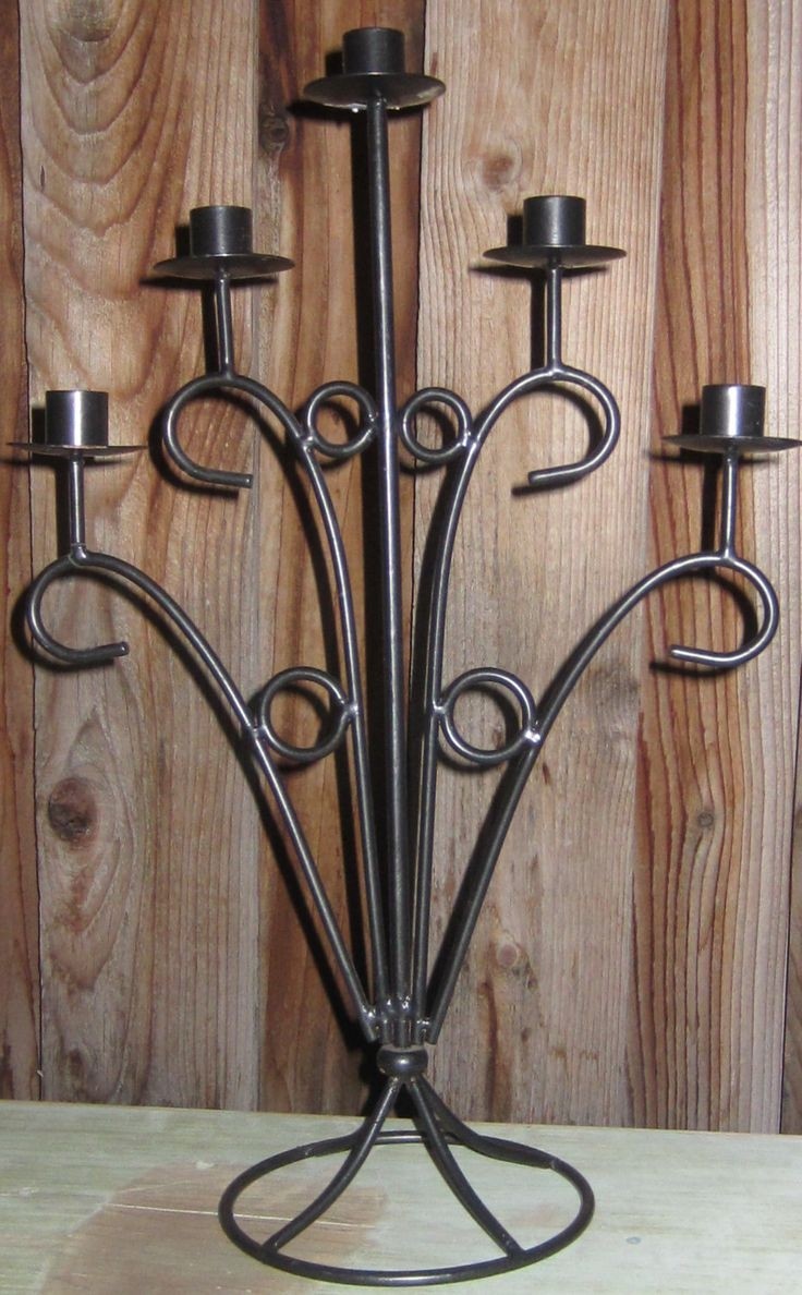 Featuring this gorgeous vintage tall black wrought iron 6